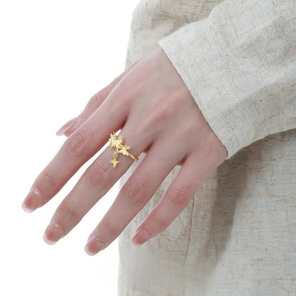 Adjustable open silver ring with a wild butterfly design in a choice of metallic finishes.