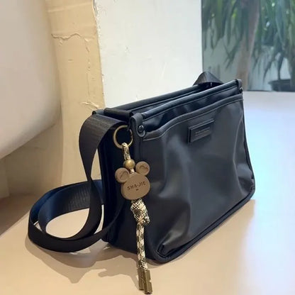 Small square Oxford cloth crossbody bag in trendy cool colour for leisure travel