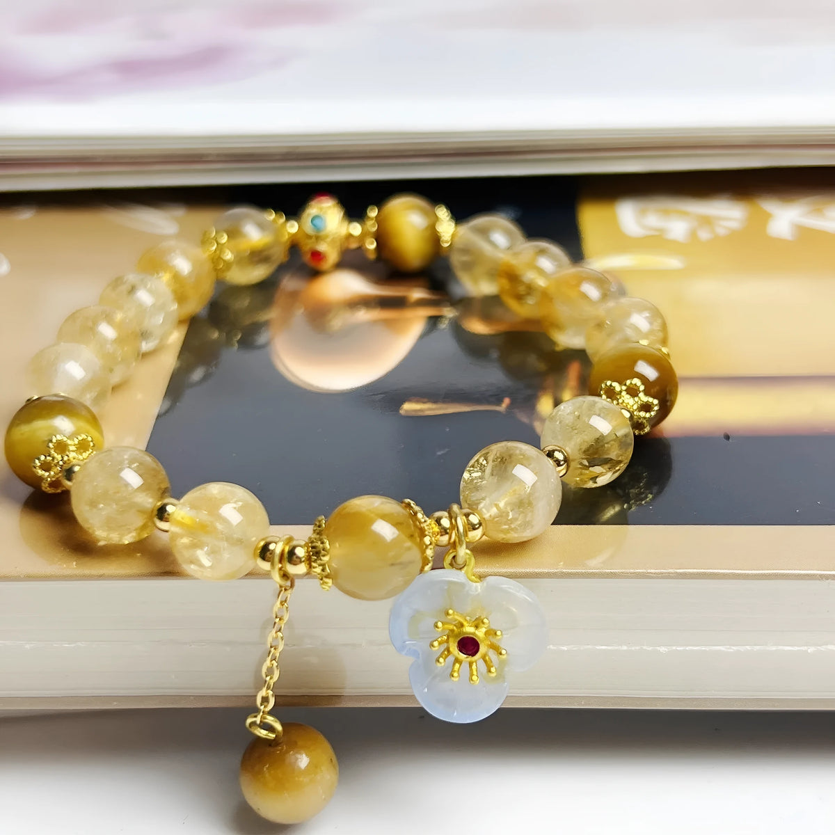 Citrine crystal bracelet with floral tassel design for women, handcrafted beadwork