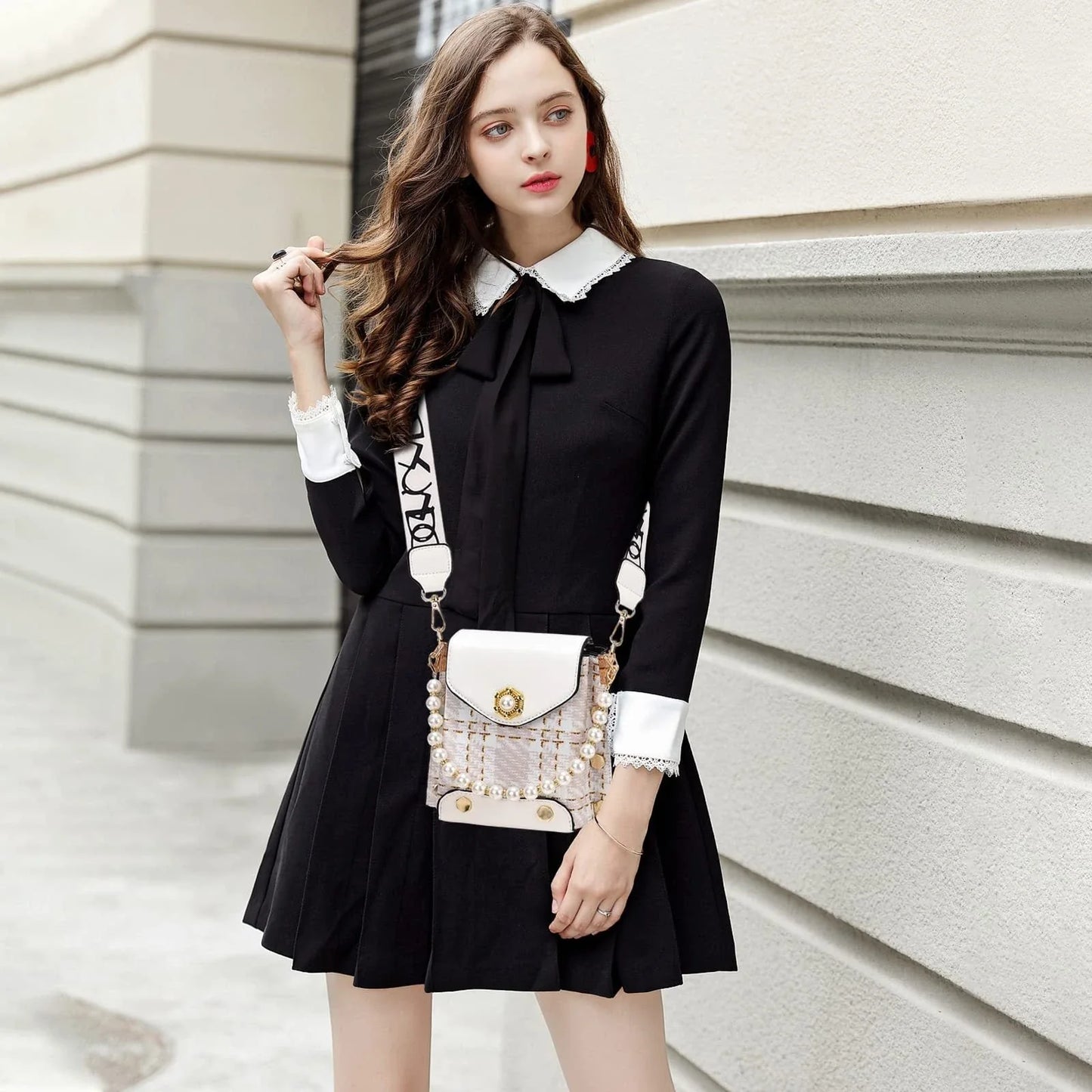 Stylish crossbody bag for women with delicate pearl pendant and adjustable strap for versatile carrying options