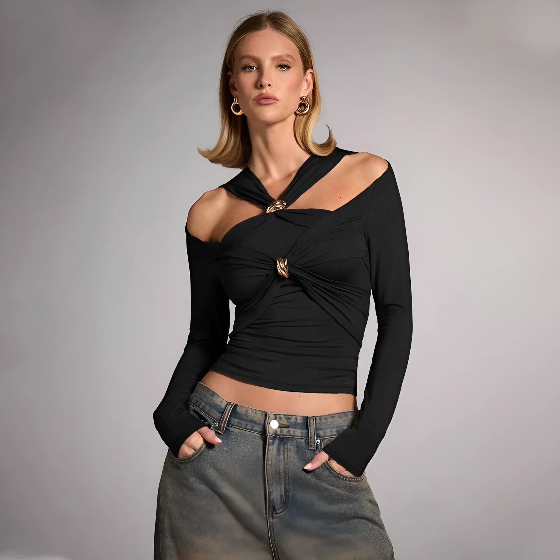 Black women's halter top with strapless design and long sleeves showing slim fit silhouette