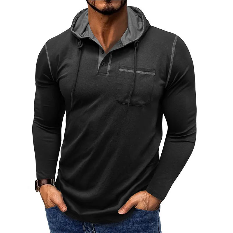 Man wearing a grey hooded henley long-sleeved t-shirt, showcasing the pullover style and cotton blend fabric.