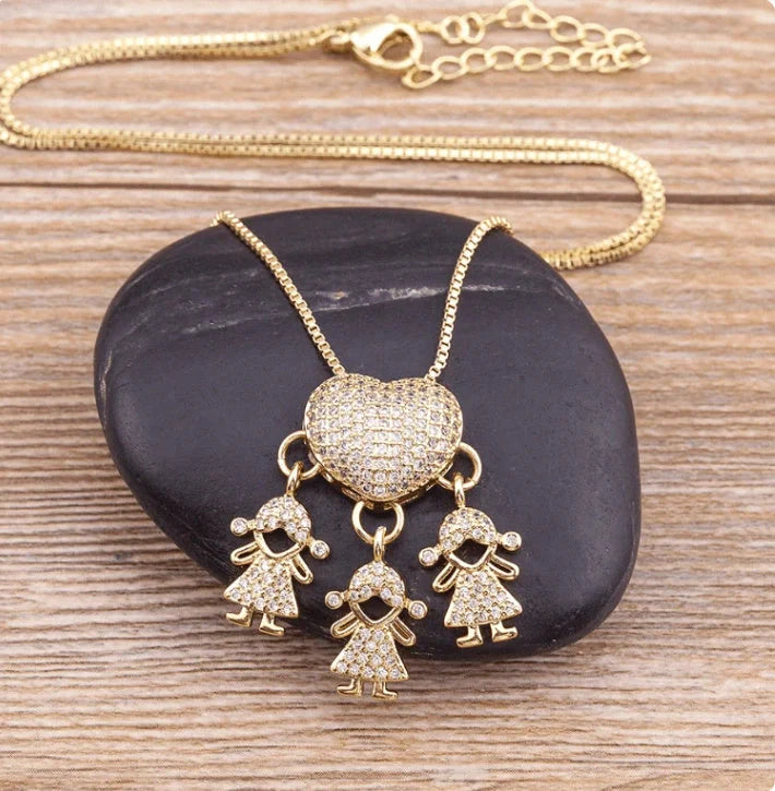 Gold cubic zirconia heart pendant necklace for mothers, symbolising family love.