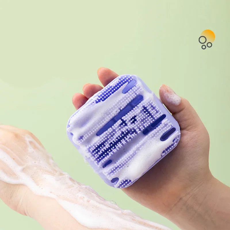 Silicone scalp massager shampoo brush with long bristles and ergonomic handle in assorted colours.