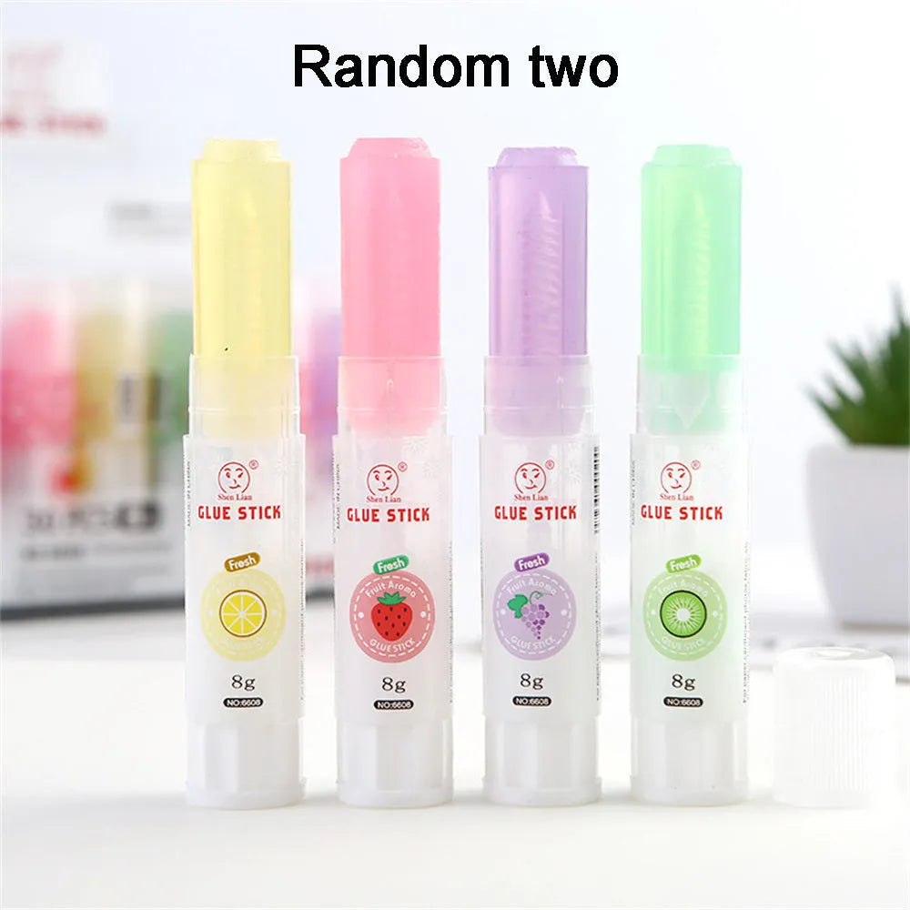Jelly solid glue stick with fruit scent, 8.5 cm long, for student and craft use.