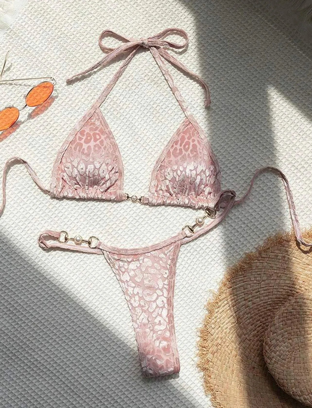 Women's leopard print bikini swimsuit set in various colours including blue and green, shown in triangle and skirt styles.