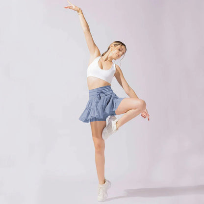 Stylish high-waist pleated skirt with lace-up accents in various colors, including black, gray, blue, apricot, pink, white, and purple