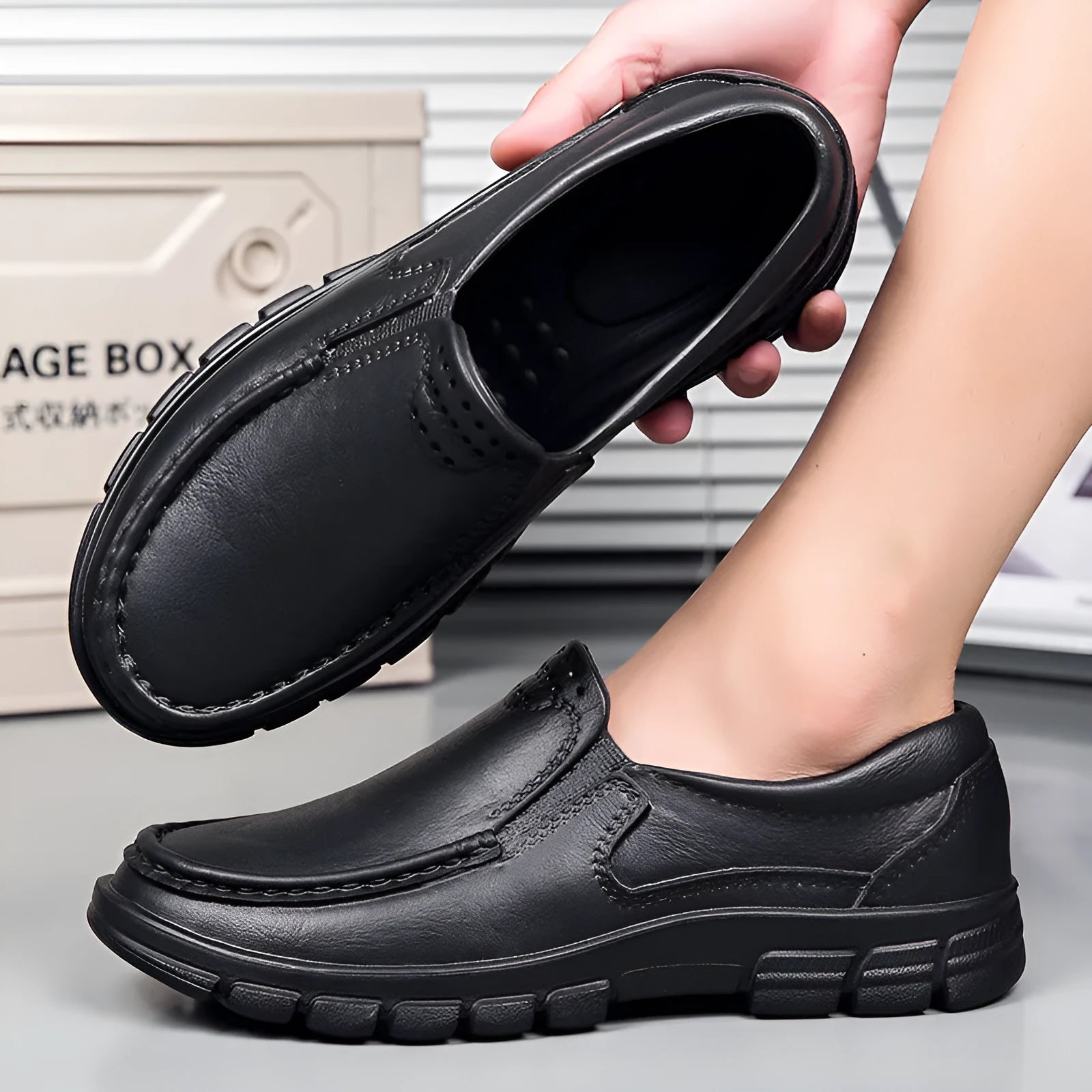 Men's black slip-on leather shoes with platform heel and round toe design