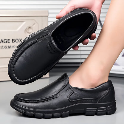 Men's black slip-on leather shoes with platform heel and round toe design