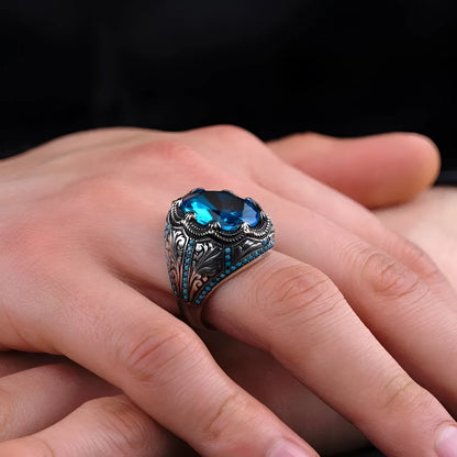 Antique silver geometric alloy ring with blue zircon stones on size chart showing 7-13