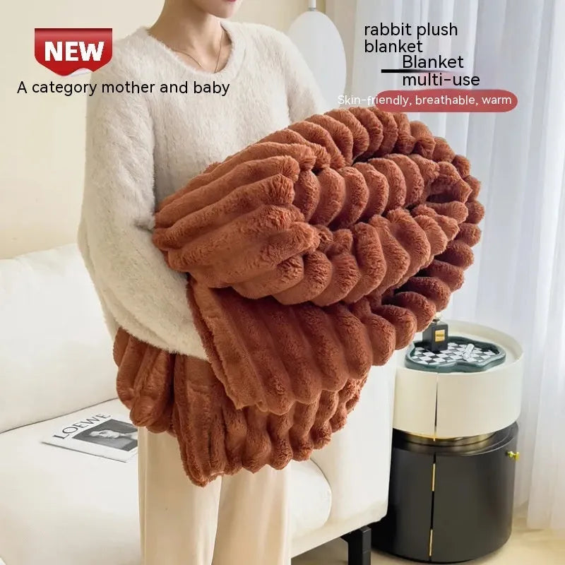 Double-sided bubble velvet faux rabbit fur blanket in a solid colour, shown folded.