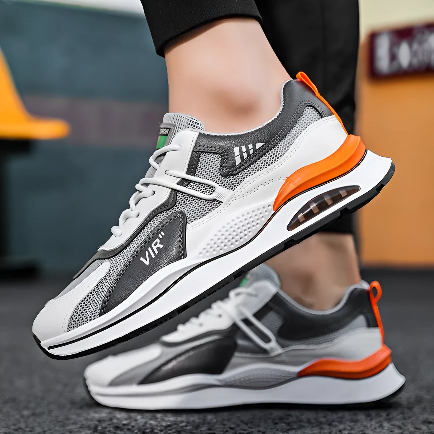 Men's gray and black mesh running shoes with EVA sole and round toe design