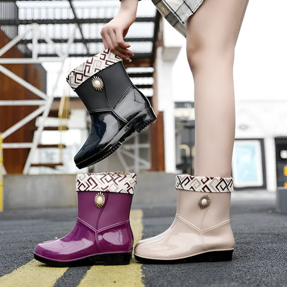 Women's mid-calf rain boots in beige, black, or purple with a non-slip sole.