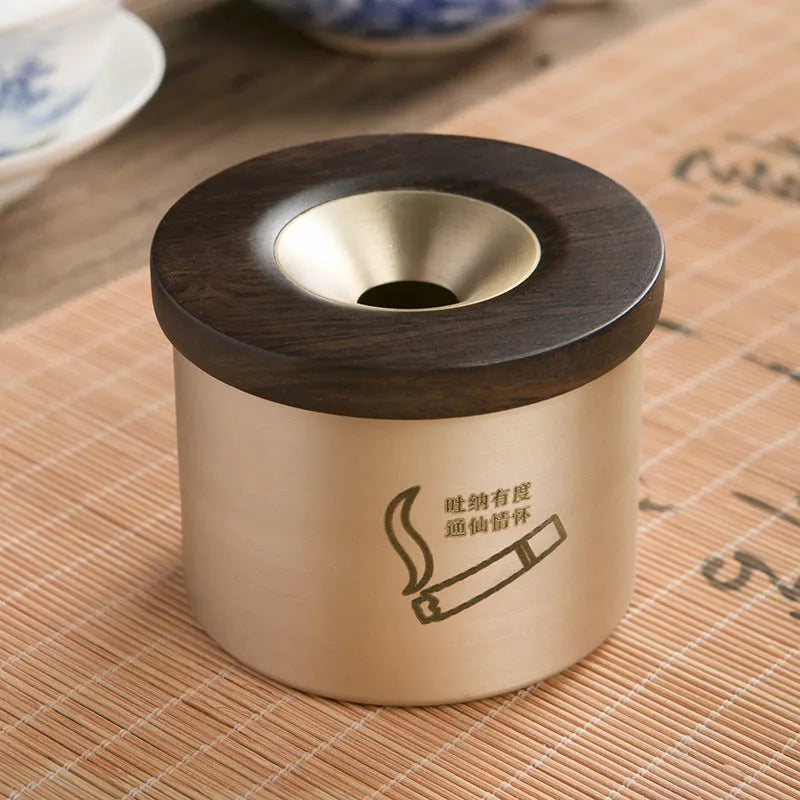 Retro brass ashtray with wooden lid on copper base, showing 12cm diameter and central hole