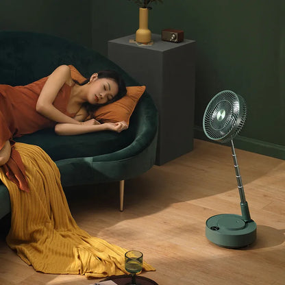 Green rechargeable floor fan with humidifier in extended position showing telescopic design