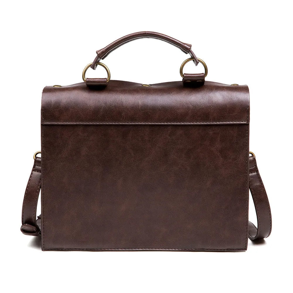 Bronze steampunk industrial retro shoulder bag with metal hardware on horizontal square pillow bag design