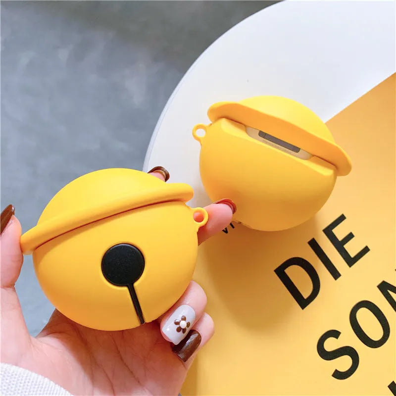 AirPods silicone protective carrying case designed for AirPods 1st and 2nd generation wireless earbuds with a hard shell and secure closure, available in a vibrant yellow colour with a cute bell charm decorative accessory.