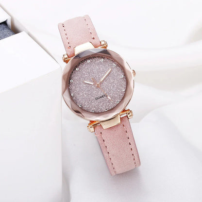 Elegant women's wrist watch with a captivating starry sky dial and leather strap, suitable for any occasion.