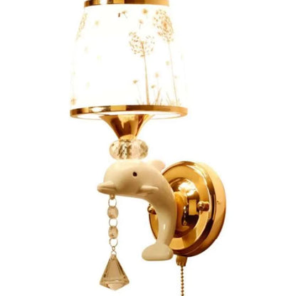 European style wall lamp with glass shade mounted on a wall, showing the cable switch.