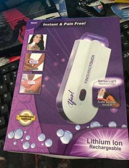 White laser hair removal machine with detachable heads showing 12cm length and included accessories