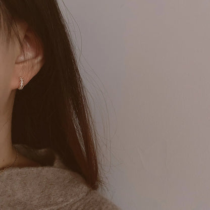 Small silver lace clip earrings with gold finish and secure clip back
