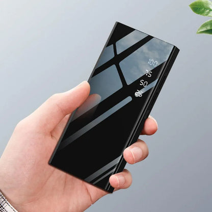 20000mAh power bank with LCD display showing battery percentage, measuring 140mm x 63mm x 22mm