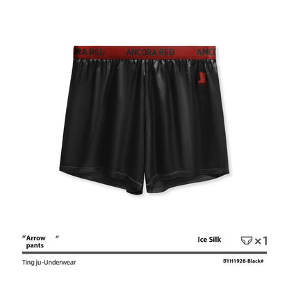 Men's solid colour boxer briefs in black, shown flat, highlighting the mid-waist design and knitted fabric texture.