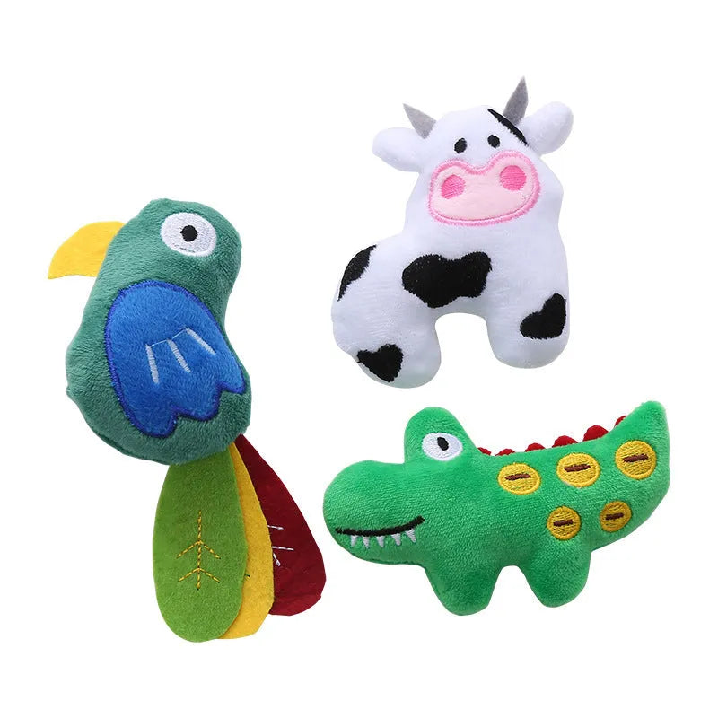 Plush cat toy in cow, crocodile, or parrot shape with colourful fabric and embroidered details.
