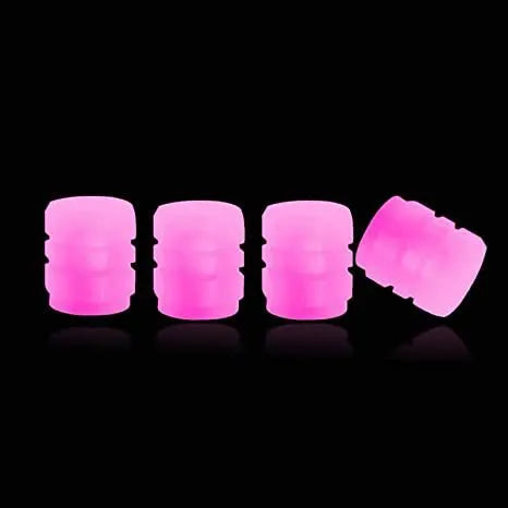 Glow-in-the-dark rubber tyre valve caps in five colour options on tyre valve stem