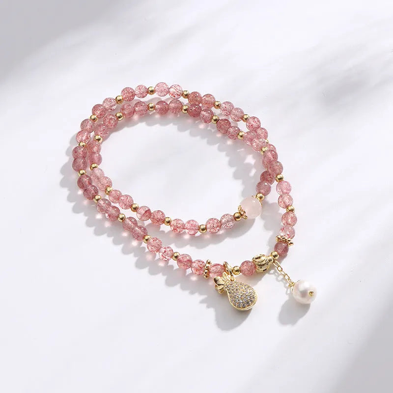 Strawberry quartz bracelet in geometric crystal design for women, this money drawing and luck changing accessory provides crystal energy benefits with its wallet-friendly styling and comes ready to wear as a single piece jewellery item.