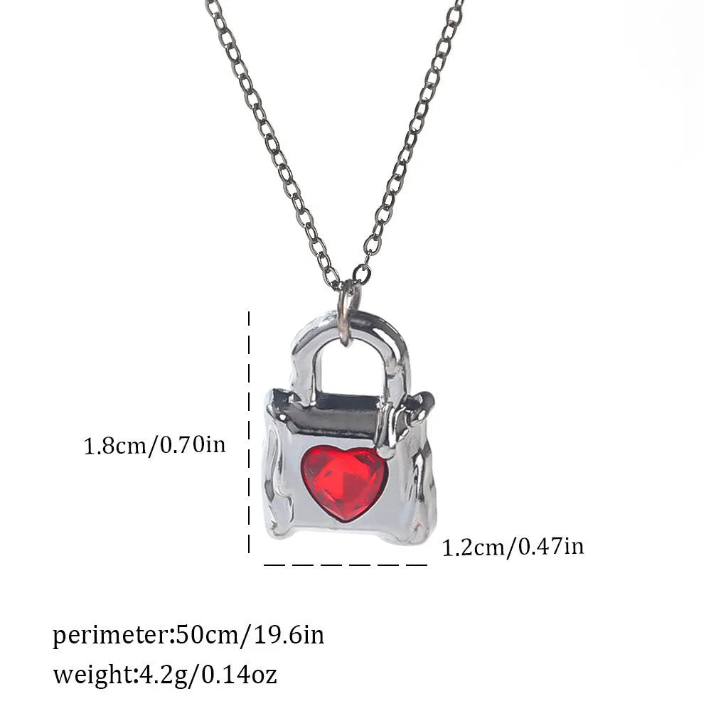 Dark gothic necklace with detailed spider bat pendant on an adjustable metal chain