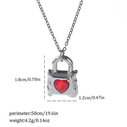 Dark gothic necklace with detailed spider bat pendant on an adjustable metal chain