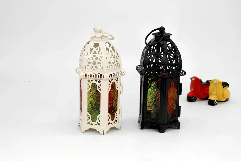 Wrought iron candle holder with 16cm height and 7cm diameter in black finish showing hanging design