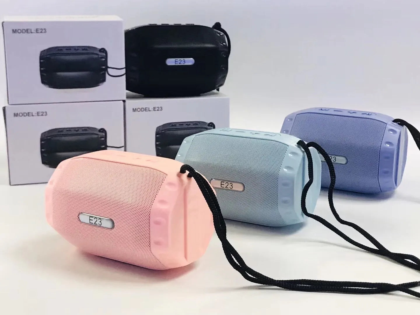 Wireless USB card Bluetooth speaker in four colour options showing compact design