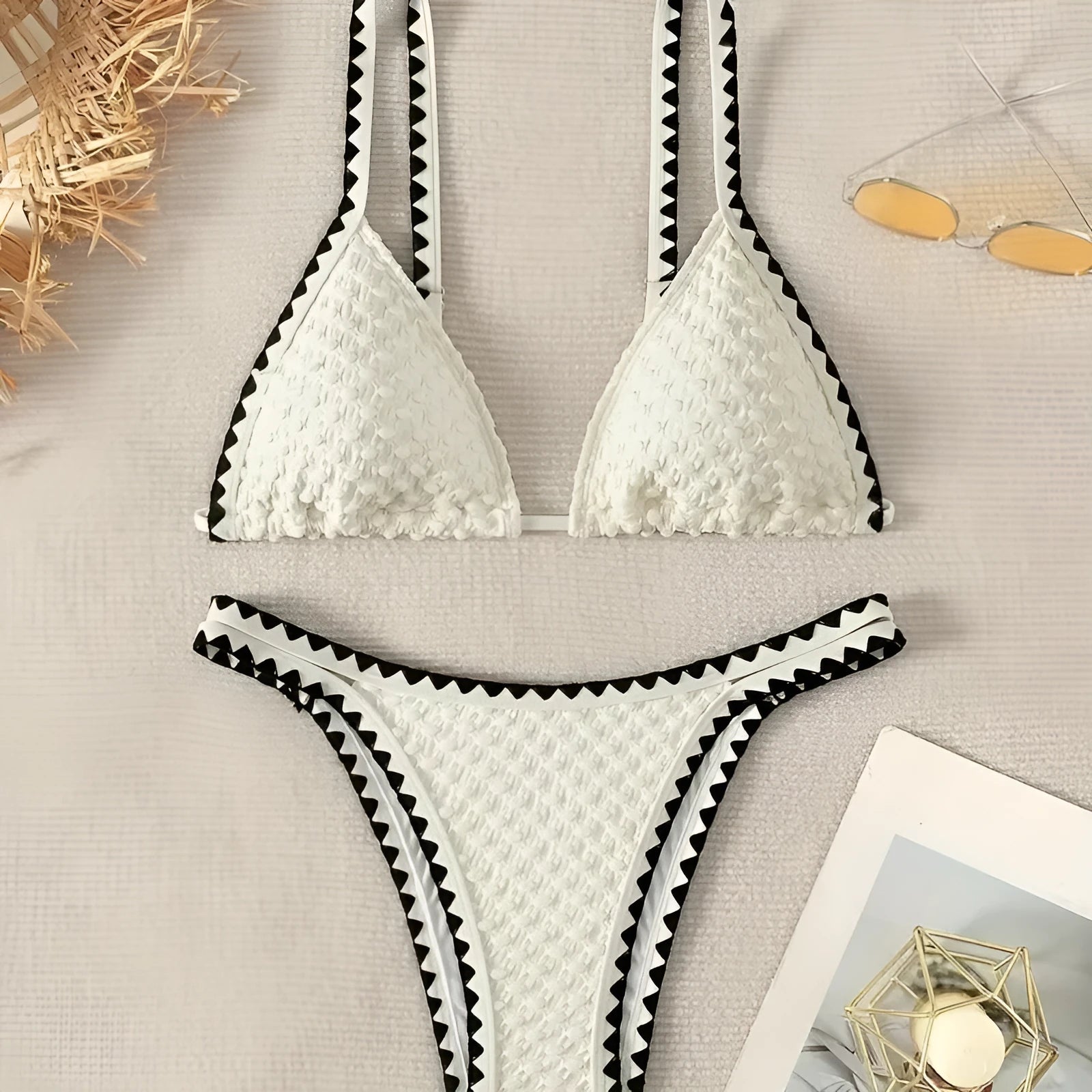 Women's blue or white two-piece bikini swimsuit with briefs style.