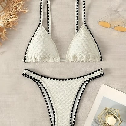 Women's blue or white two-piece bikini swimsuit with briefs style.