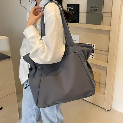 Soft Oxford cloth foldable commuter tote bag in street trend style, shown in available colours.