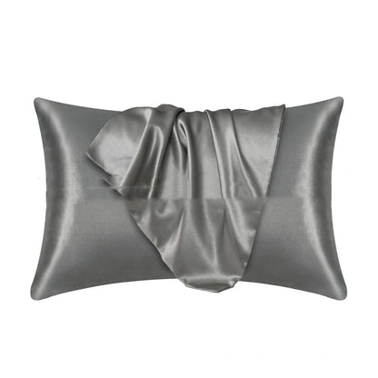 Envelope closure pillowcase in navy blue showing overlapping flap design and smooth polyester fabric texture