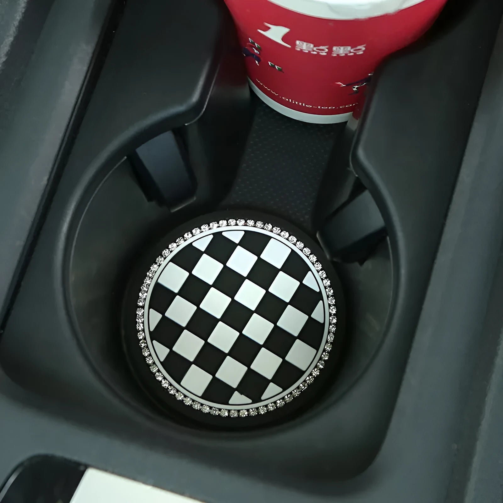 PVC plastic car cup holder mat with non-slip textured surface in black and white checkerboard pattern