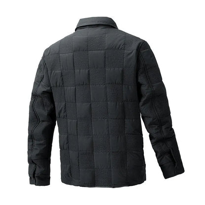 Man wearing a quilted polo collar shirt jacket in army green, showing the wool lining and knitwear style.