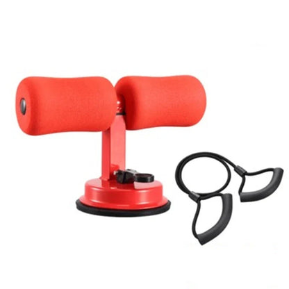 Compact sit-up strength trainer with steel springs and foam padding for home fitness