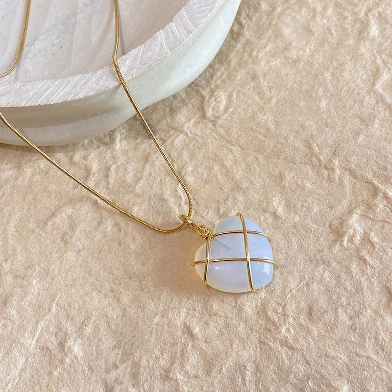 Elegant gold-plated moonstone necklace with a heart-shaped pendant, perfect for fashionable women and girls