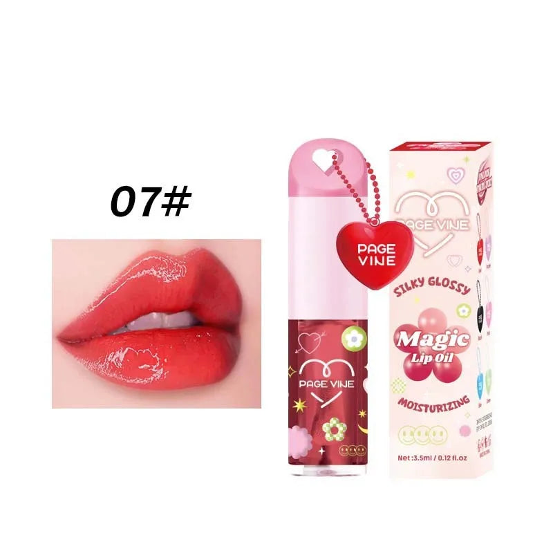 Colour-changing lip gloss with love pendant charm on applicator, from the Princess series.