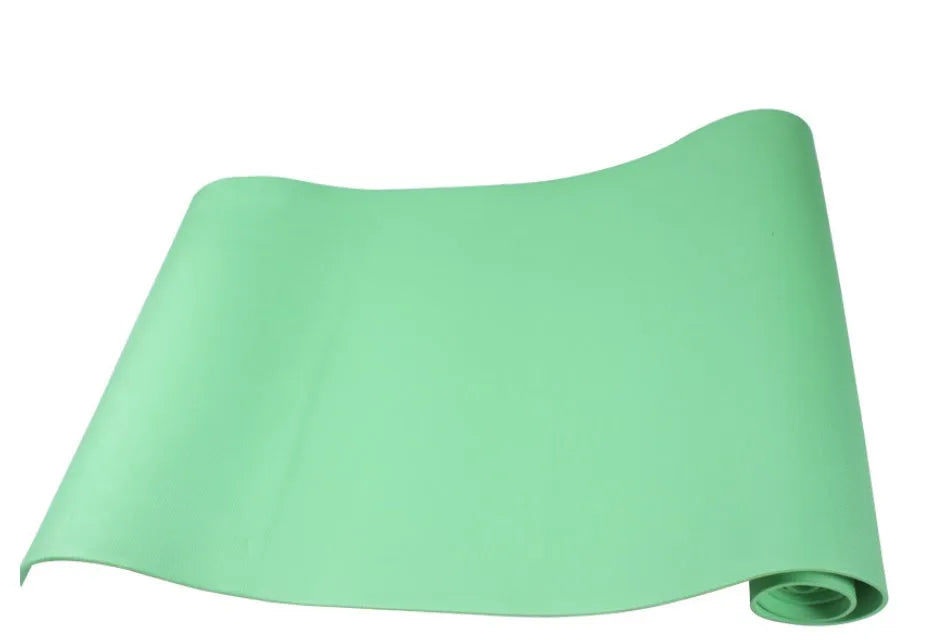 EVA composite fitness and yoga mat in blue, showing its texture and rolled edge next to a storage bag.