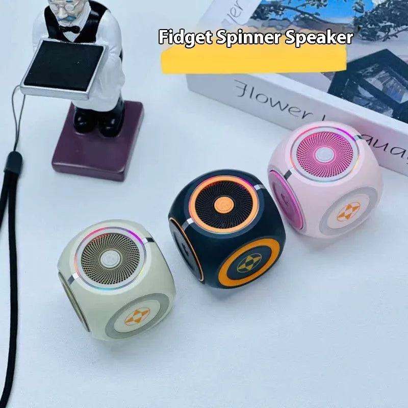Rotating gyro bass Bluetooth speaker in black, pink or green, 53x51x51mm, with USB cable