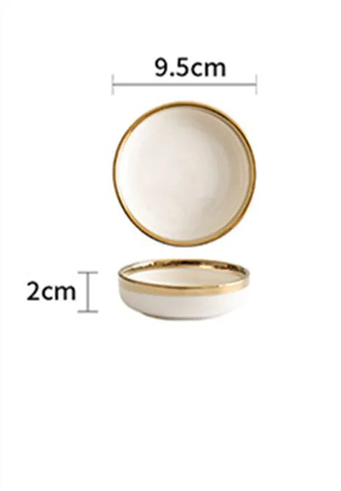Platinum-coloured porcelain bowl and plate with gold rim, part of a wedding gift tableware set.