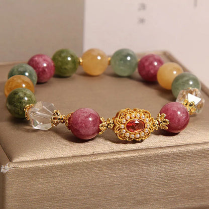 Jade colour tourmaline and alloy bracelet for women with pearl crystal base and rhinestones.