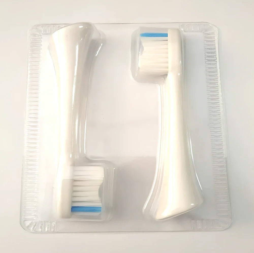 White waterproof electric toothbrush with inductive charging base and 5 nursing mode settings