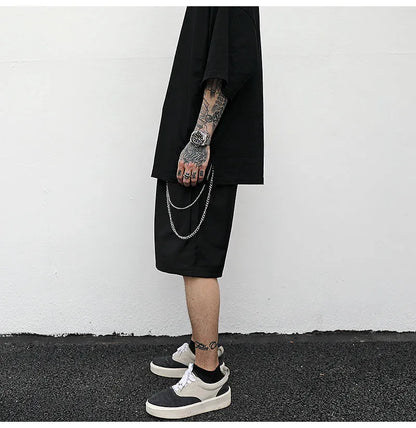 Black cotton trouser chain suit shorts with chain detail, available in sizes S M L XL
