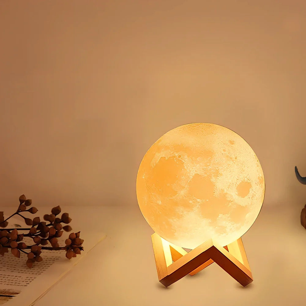 3D printed moon night table lamp on wooden holder, remote showing 16-colour options, 15cm size for bedside use
